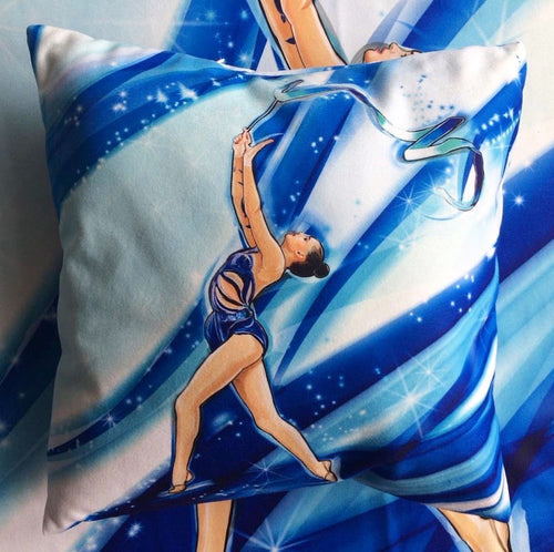 blue pillow with gymnast print