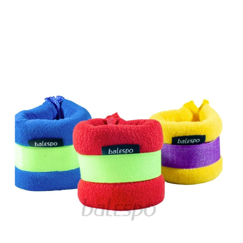 a set of blue, red, yellow ankle weights